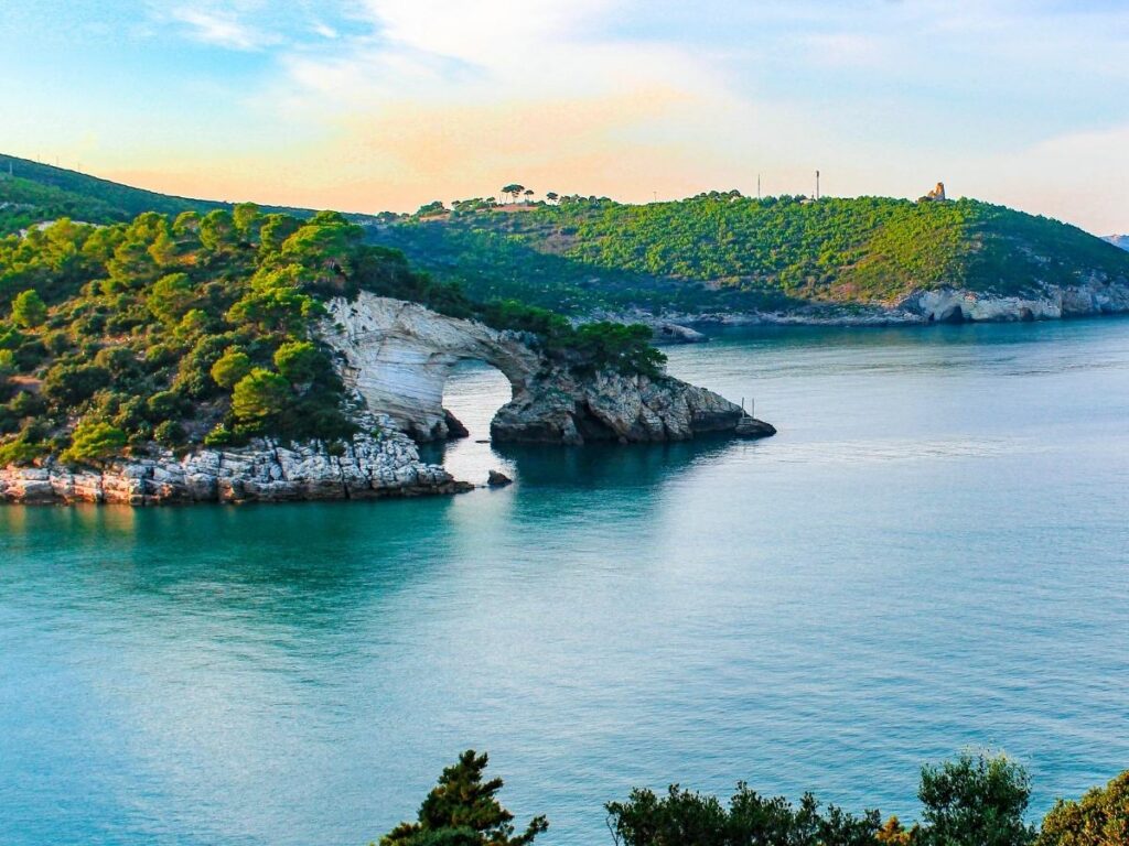 Limestone cliffs and sea caves along Gargano coast in Puglia, Italy