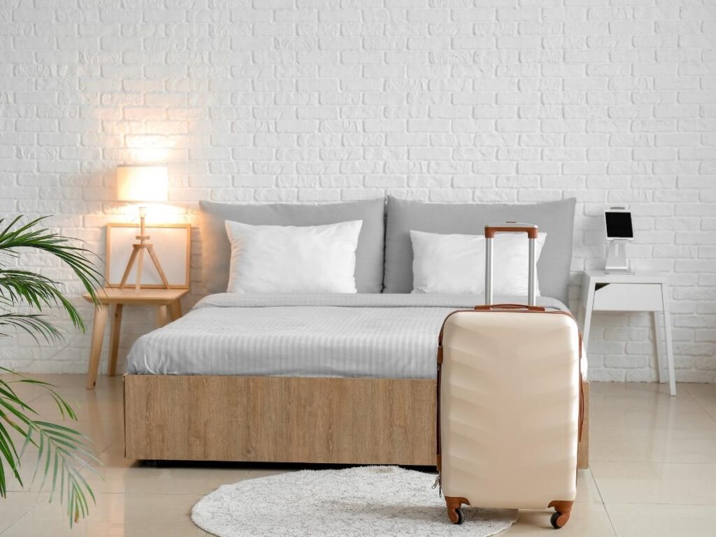 Suitcase placed neatly in a hotel room