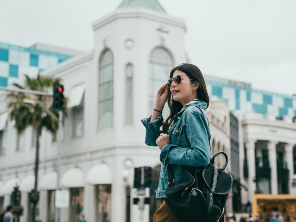 Traveler wearing a light denim jacket.