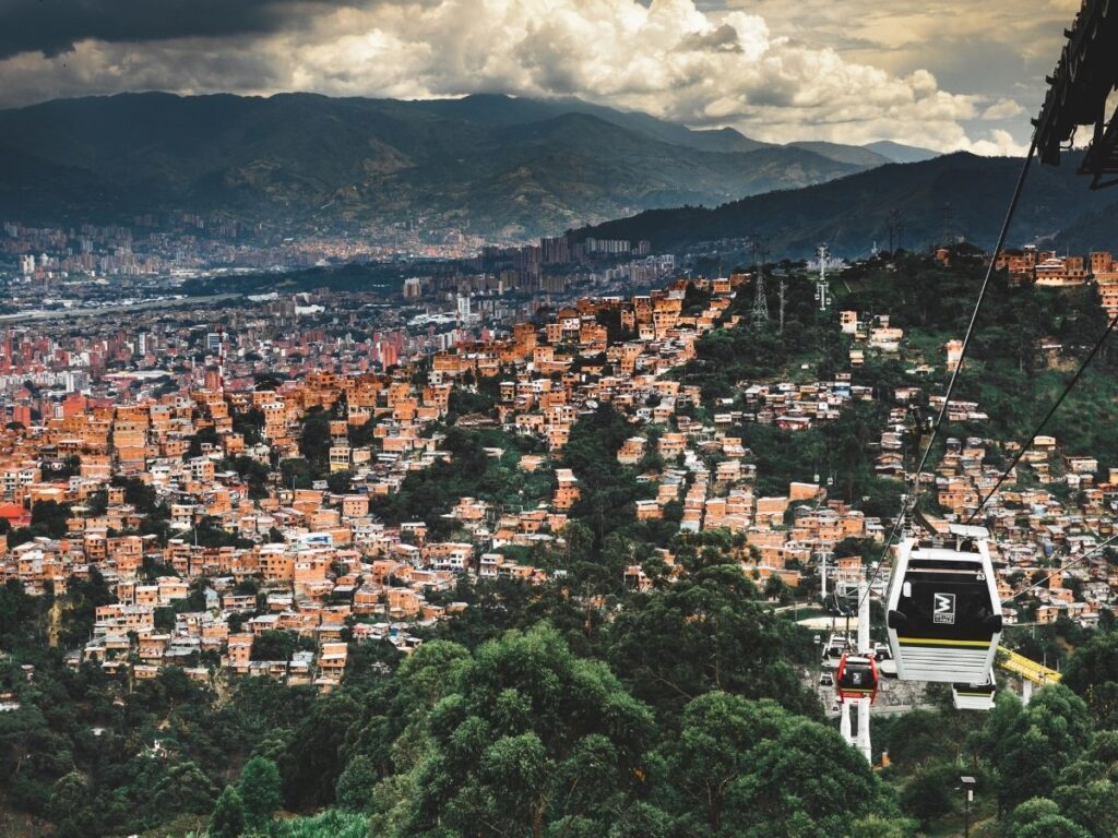 Medellín skyline with cable cars and lush green hills