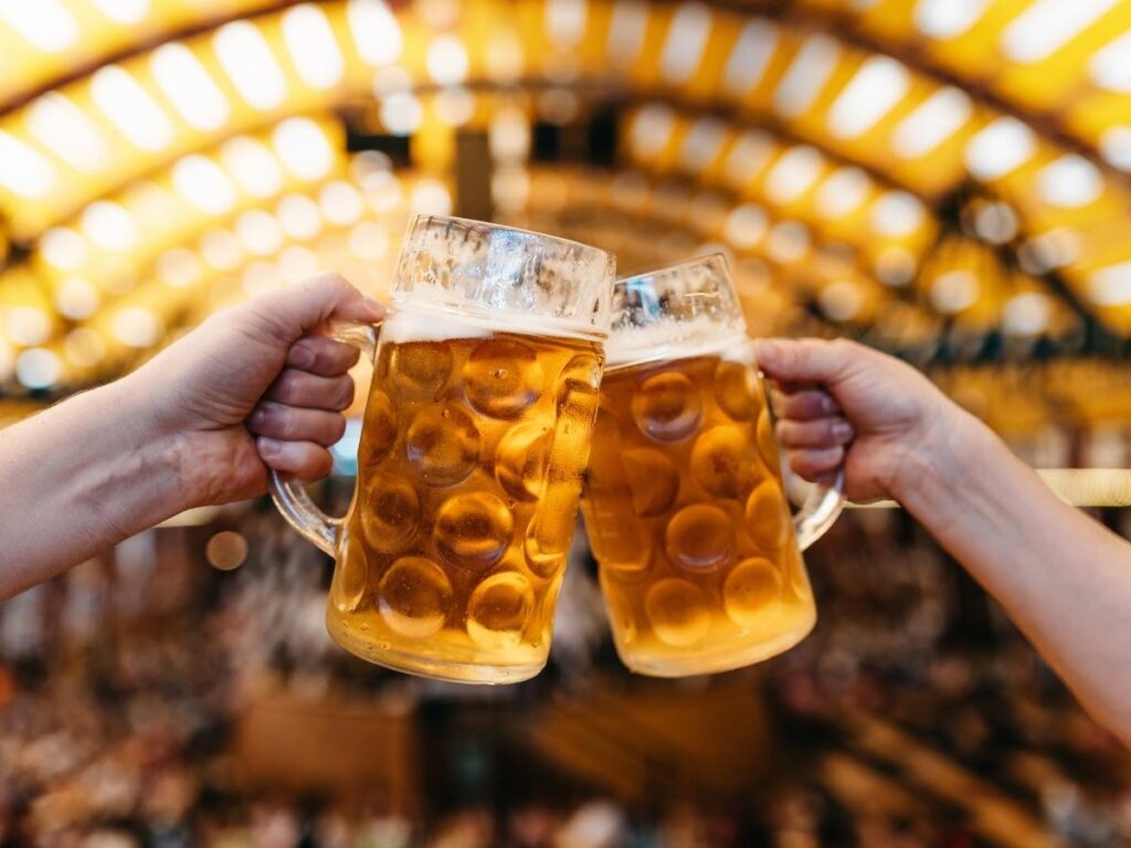 Locals enjoying beer at a biergarten in Munich’s English Garden.