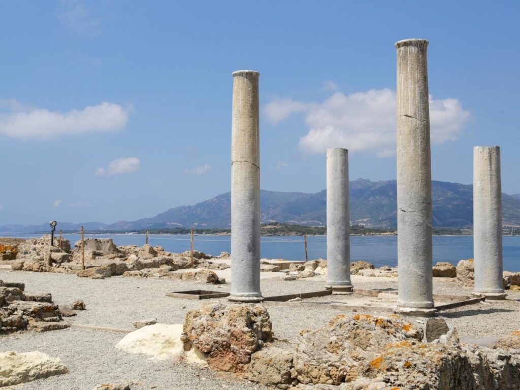 Roman amphitheater at Nora archaeological site by the sea in Sardinia