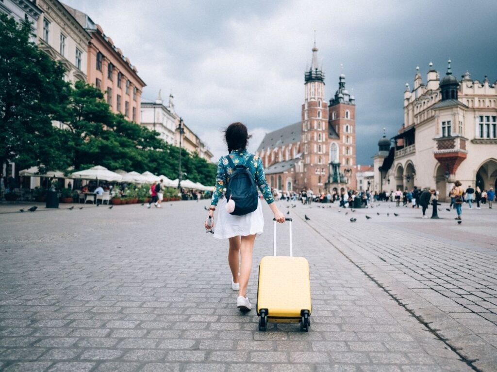 Solo traveler walking confidently through a new city