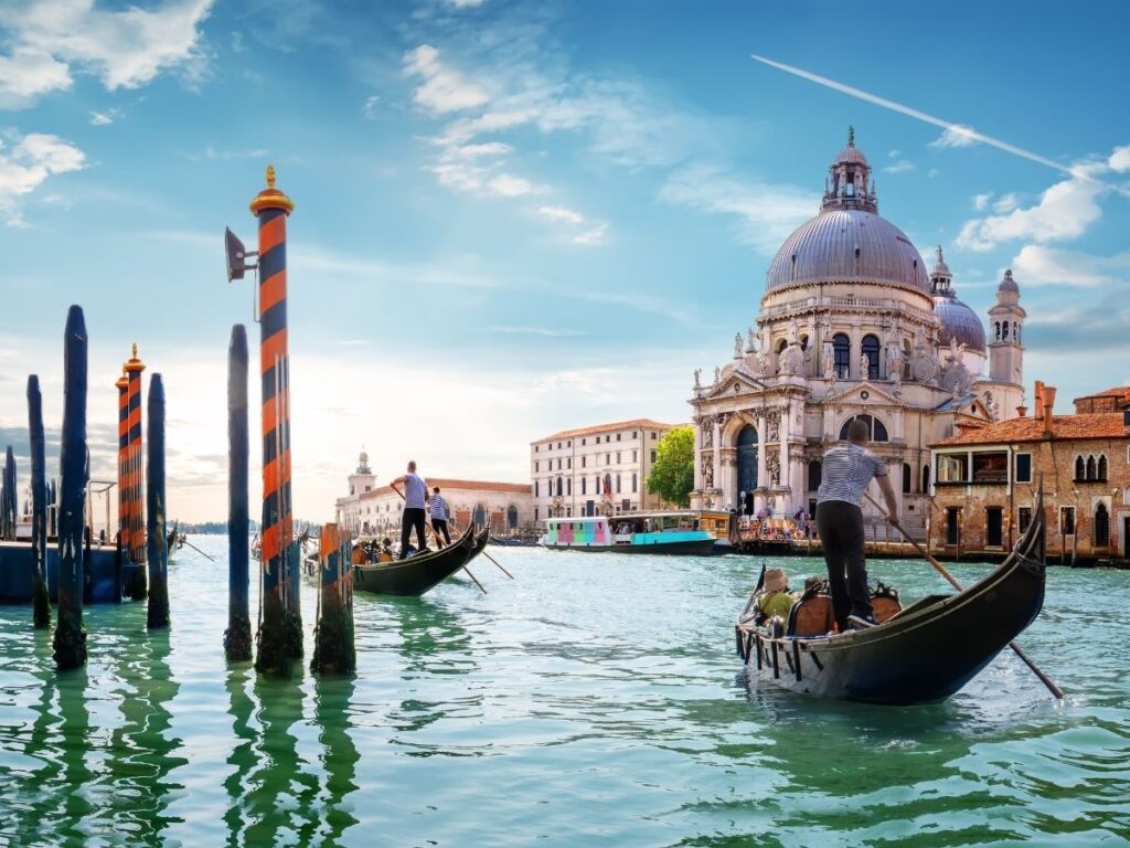 Grand Canal in Venice with gondolas and colorful historic buildings