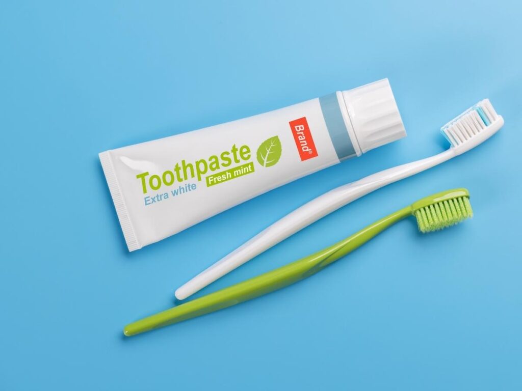 Travel toothbrush and toothpaste set.