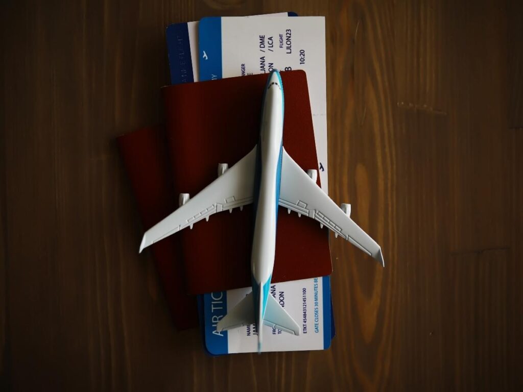 Passport and boarding pass ready for airport check-in.