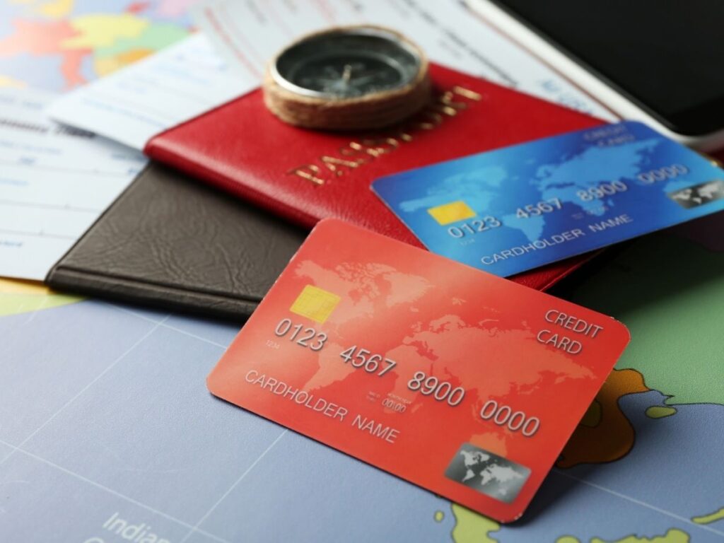 Passport and travel credit card ready to earn points for future trips