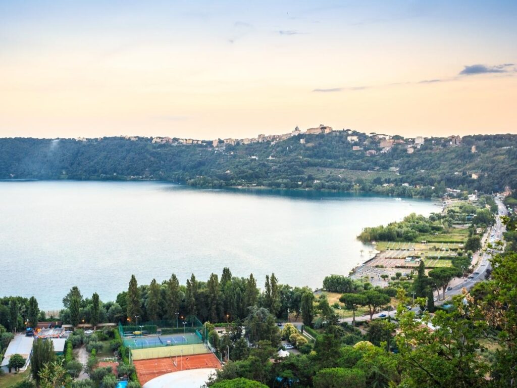Panoramic view from Castel Gandolfo over the blue waters of Lake Albano