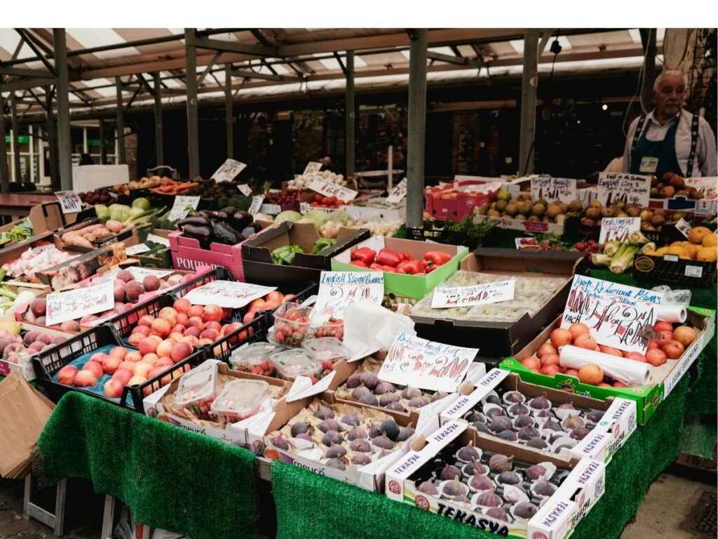 Stalls of fresh truffles and mushrooms at an autumn food festival in Emilia-Romagna