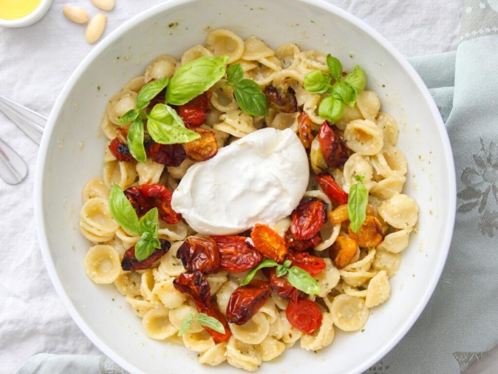 Handmade orecchiette pasta and fresh burrata cheese in Bari Vecchia.