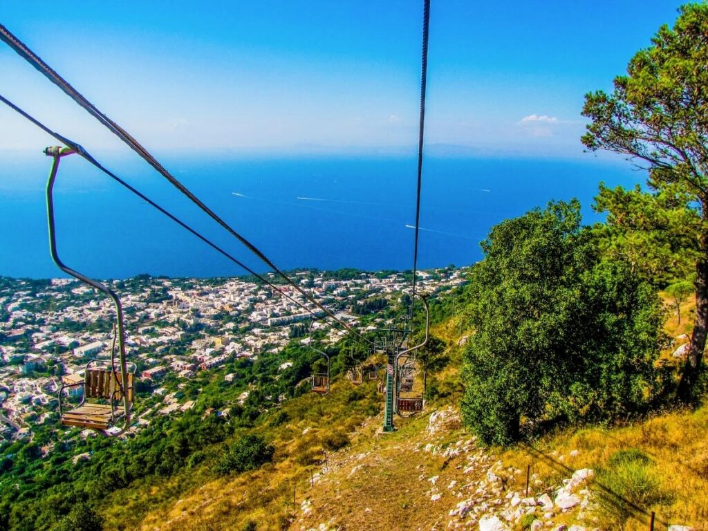 Sweeping panorama of Capri island from Monte Solaro chairlift.