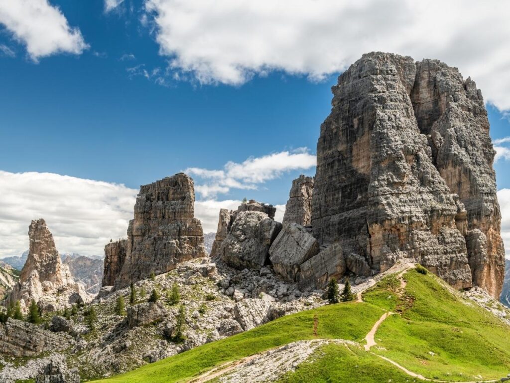 Cinque Torri rock formations with World War I trenches and hiking trails in the Dolomites, Italy.