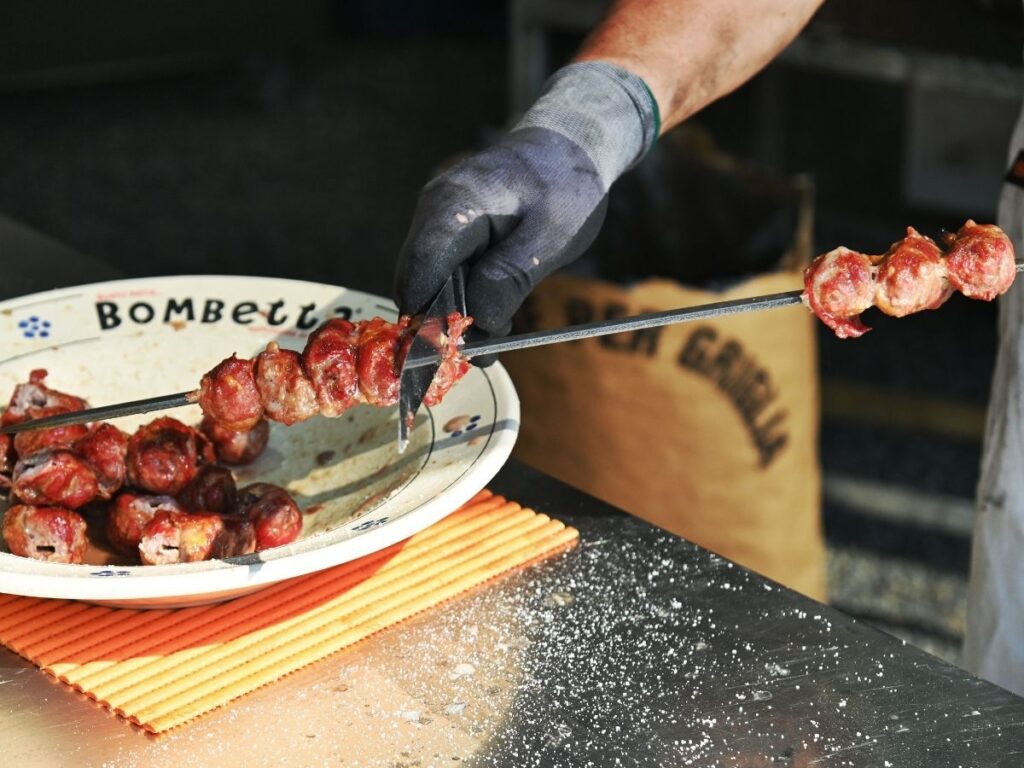 Bombette pork rolls being grilled at a butcher’s shop in Cisternino.