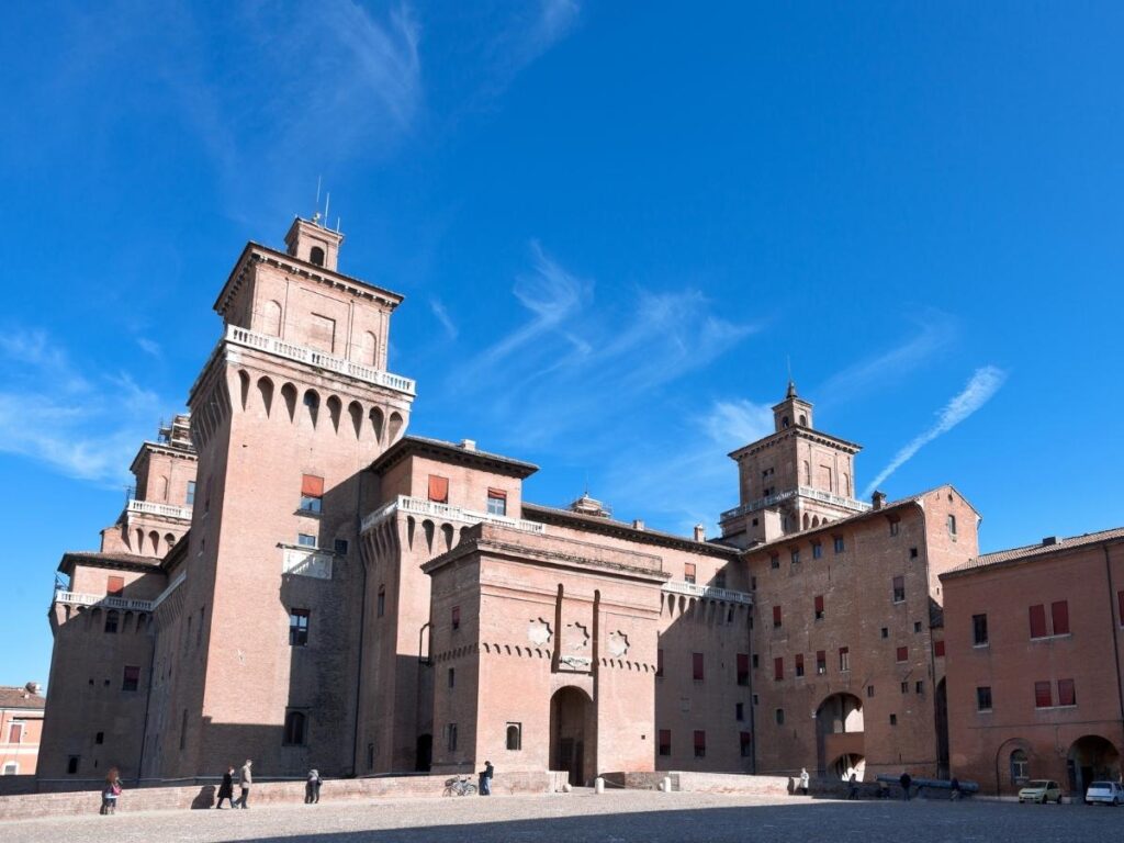 Este Castle surrounded by a moat in the heart of Ferrara.