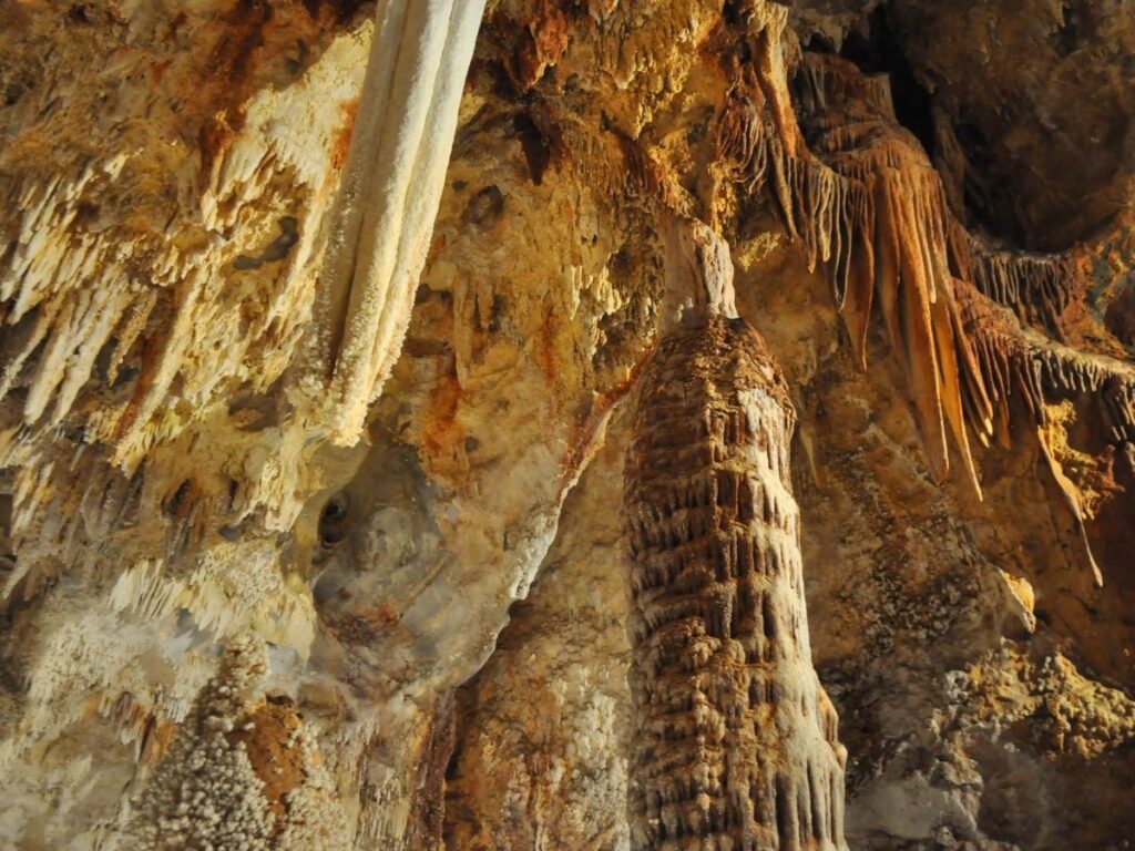 Stalactites and stalagmites inside Castellana caves in Apulia.