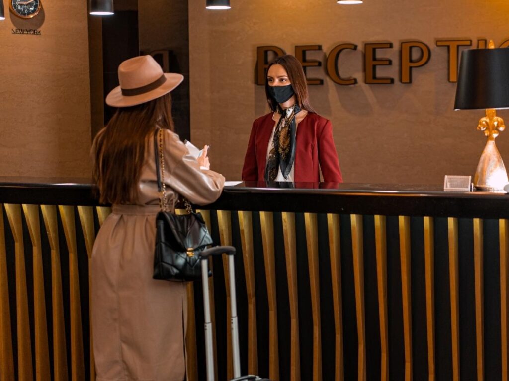 Traveler surprised by hidden resort fees on a hotel bill