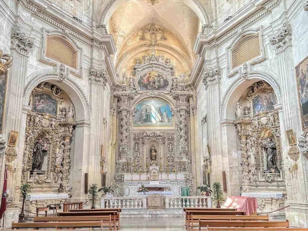 Baroque architecture of Lecce with golden stone glowing at sunset