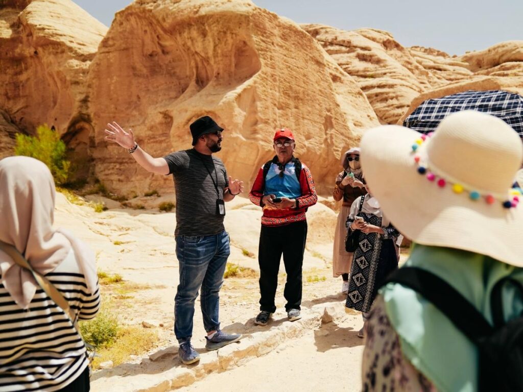 Local guide talking to travelers.