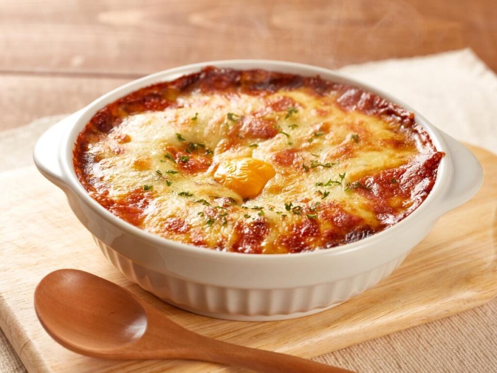 Crispy frico made with Montasio cheese and potatoes served in a mountain hut