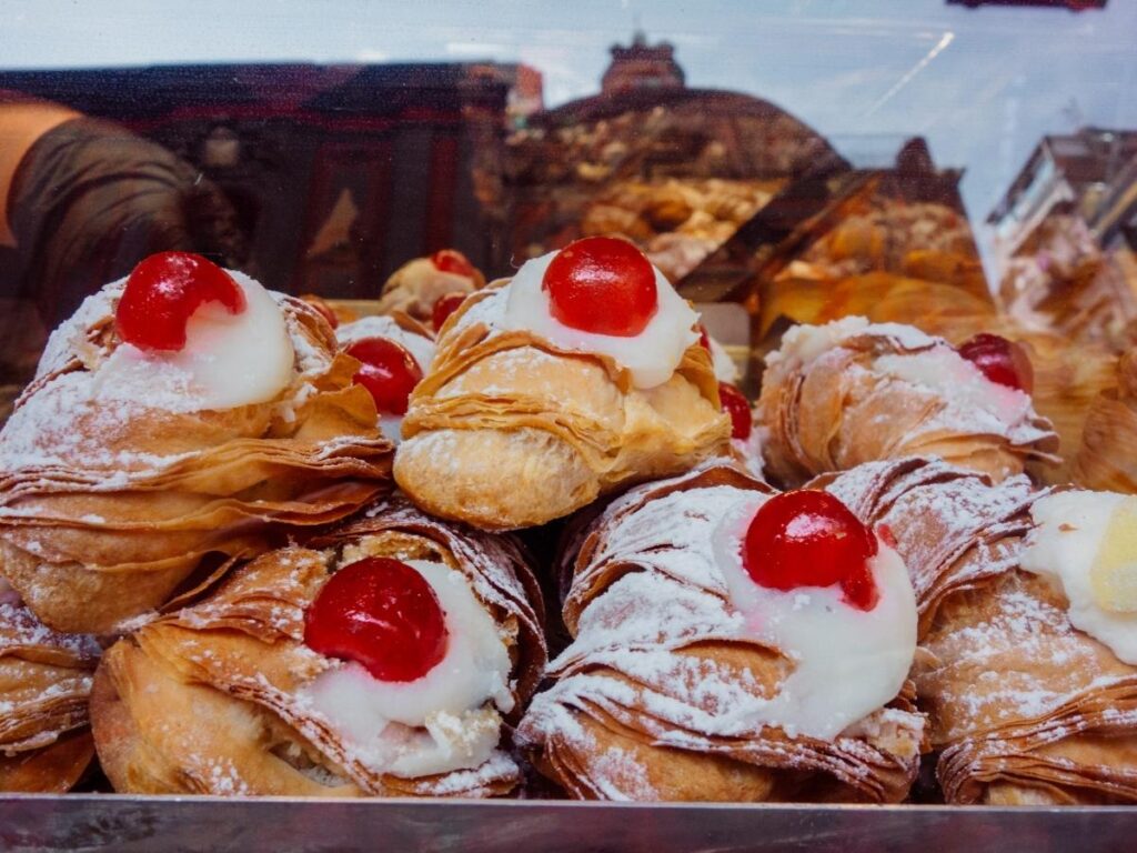 Close-up of a freshly baked sfogliatella pastry in Naples.
