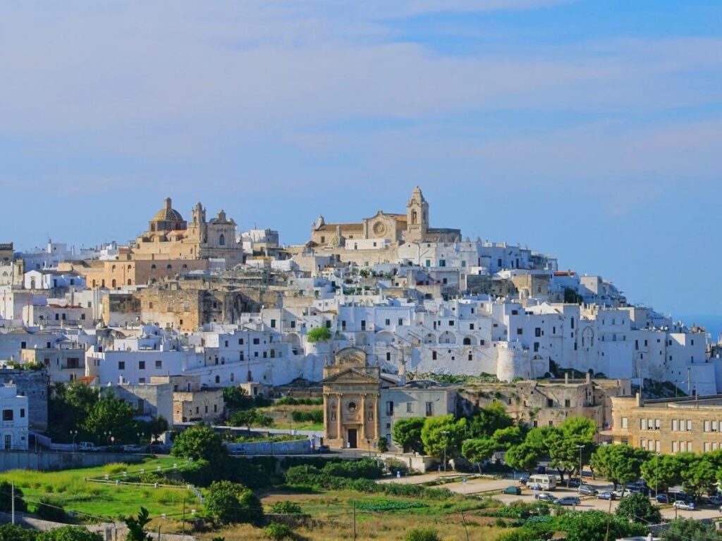 Ostuni’s whitewashed alleys and hillside views in late afternoon light.