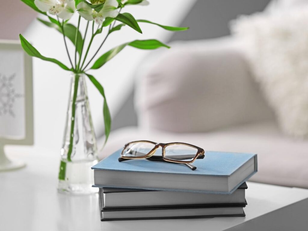 stack of books, showing how physical books add bulk