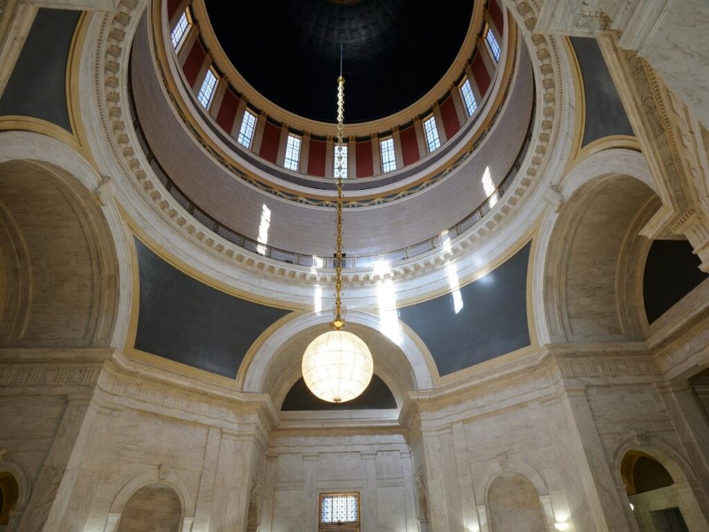 Inside Pisa Baptistery showing the circular dome and acoustic demonstration space.