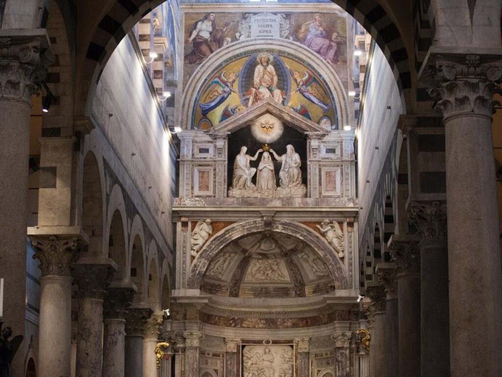 Interior of Pisa’s Duomo with golden mosaics and marble columns