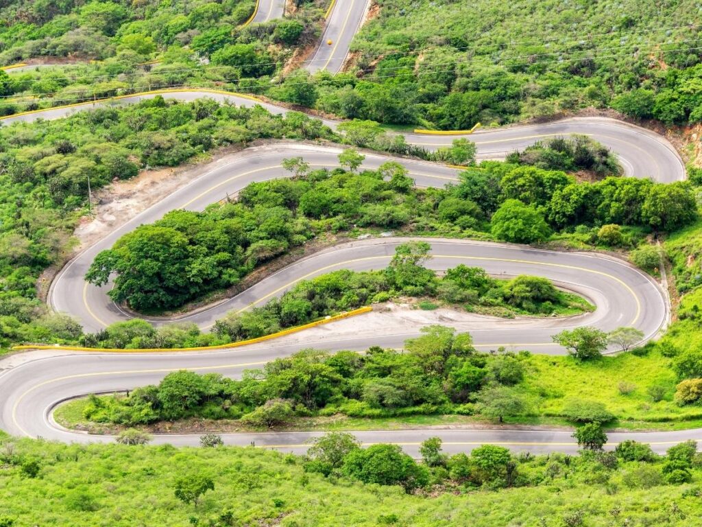 Mountain road with hairpin bends on the Sellaronda scenic drive in the Dolomites.