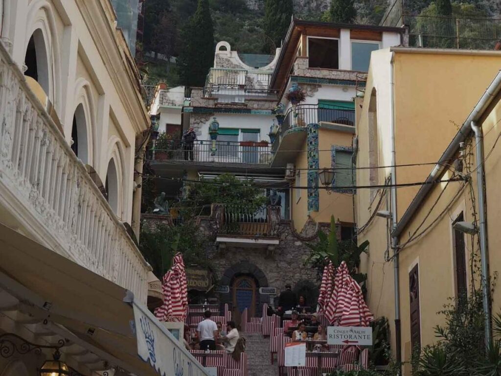 Ancient Greek theatre in Taormina framed by the sea and Mount Etna beyond