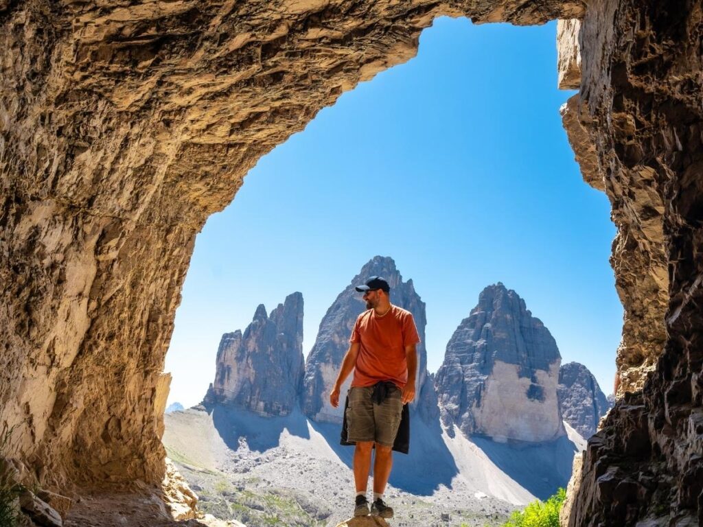 Hiking trail around Tre Cime di Lavaredo with Rifugio Locatelli and dramatic peaks in the Dolomites.