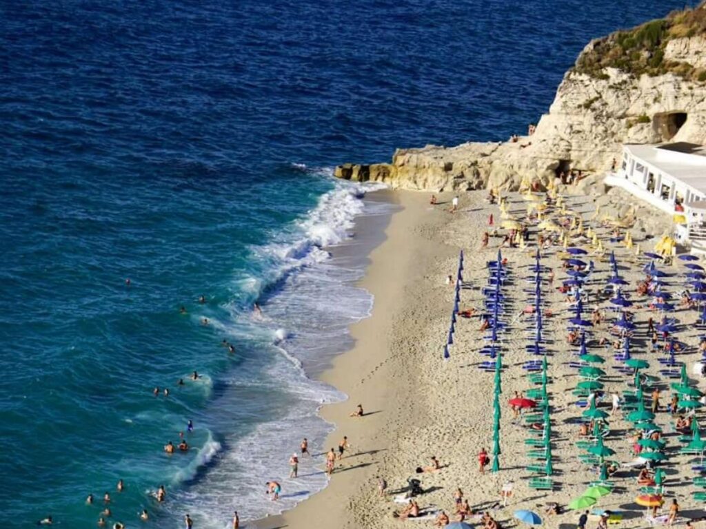 Spiaggia della Rotonda beach with turquoise water and golden sand, Tropea