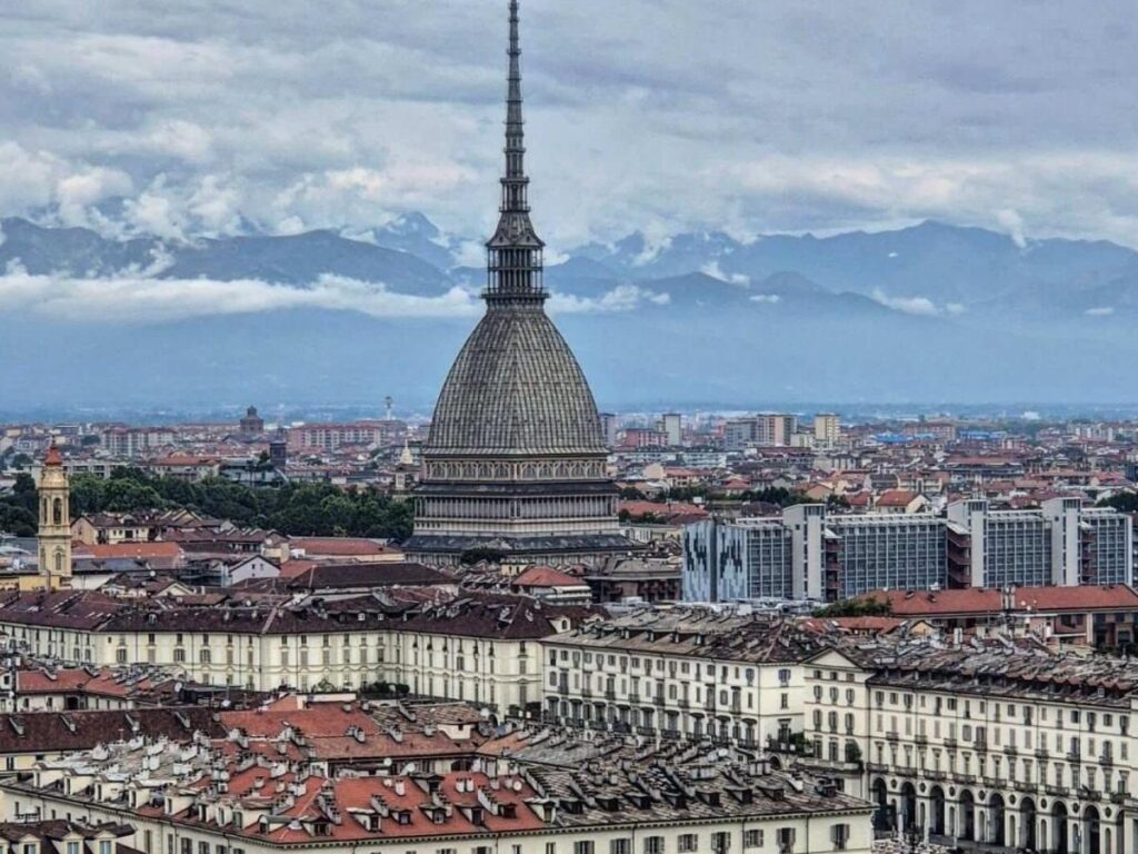 View of Turin with the Mole Antonelliana and the Alps in the distance