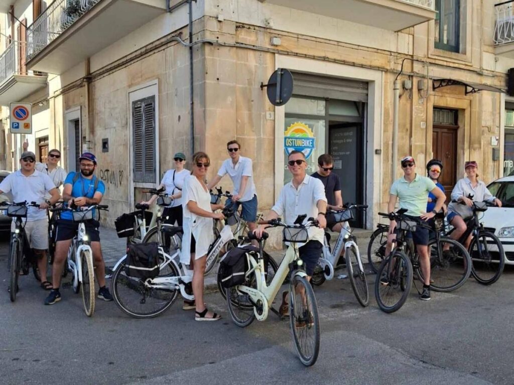 Cycling path through olive groves and trulli in Valle d’Itria.