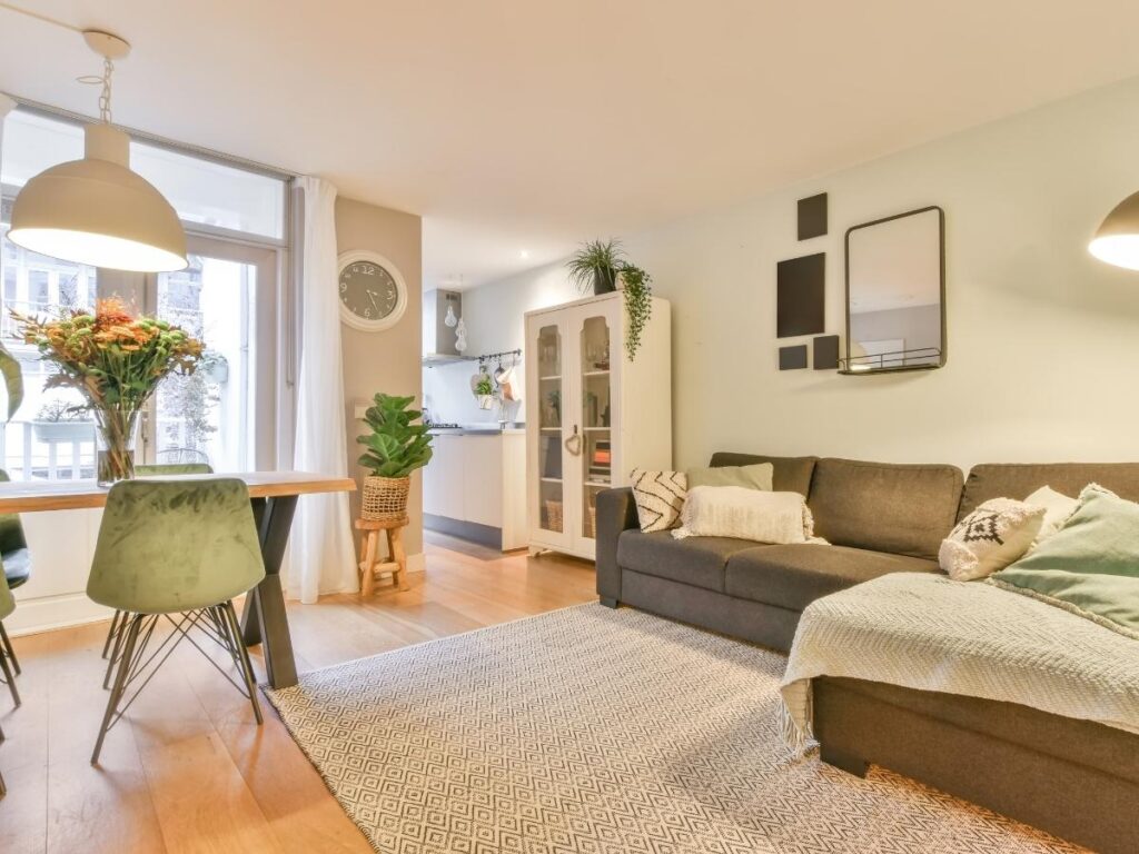 Staying in cozy Airbnbs or house-sitting homes to save on travel costs