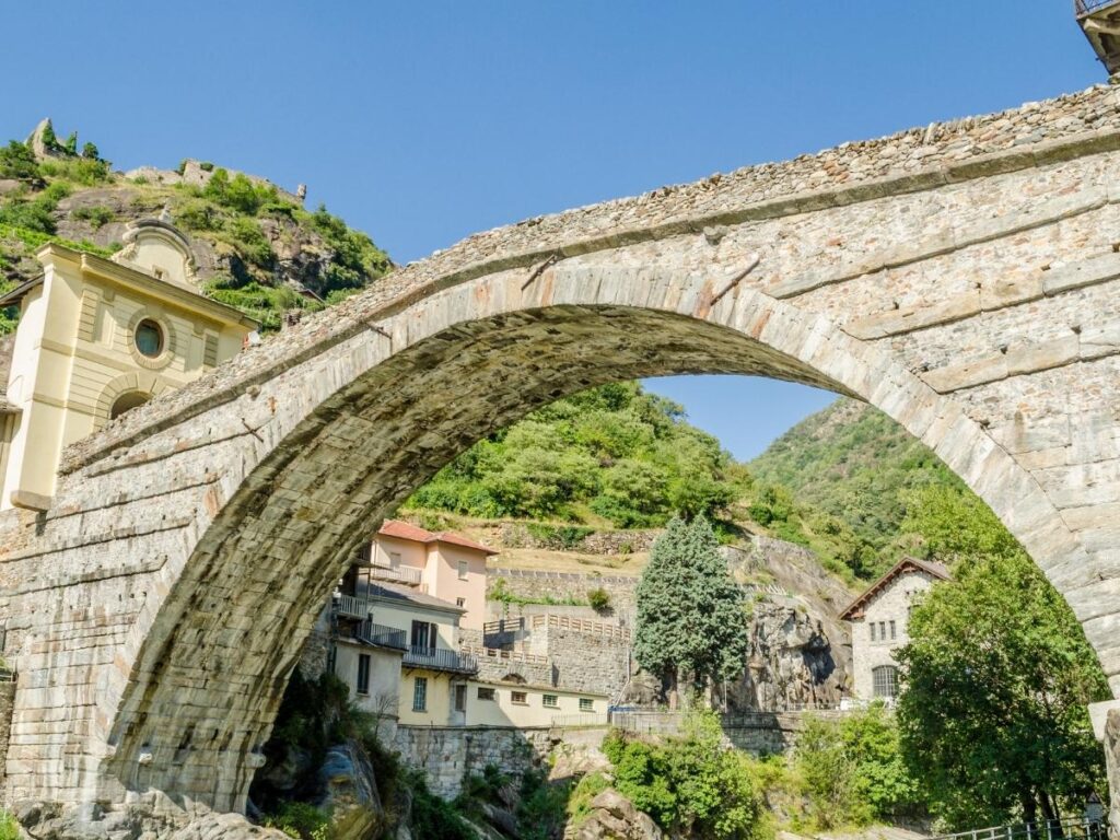 Pont d’Aël Roman aqueduct bridge crossing a deep gorge with glass walkway section.