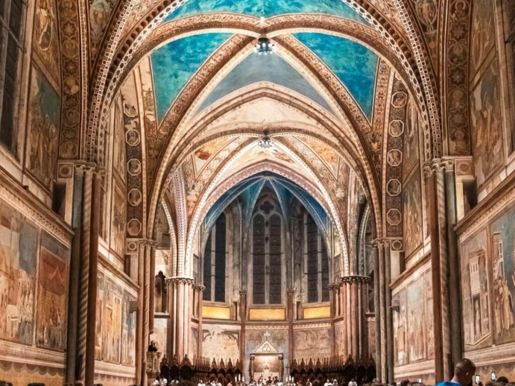 Interior view of the Basilica di San Francesco focusing on Giotto style frescoes