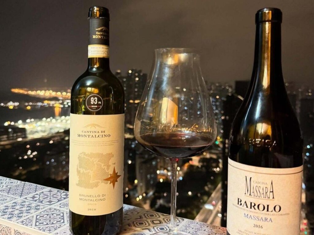 Wine glasses lined up for tasting in a Barolo cellar, Piedmont.