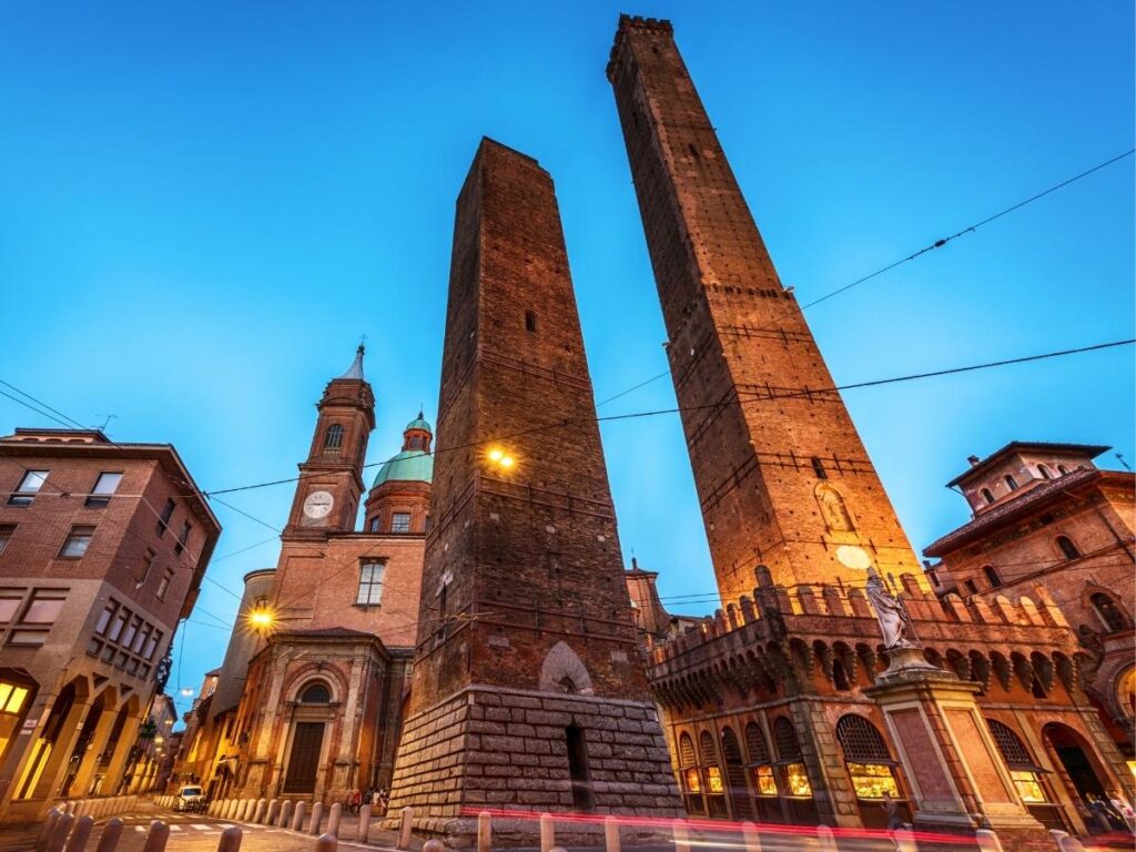 Panoramic view of Bologna’s terracotta rooftops from the top of Asinelli Tower