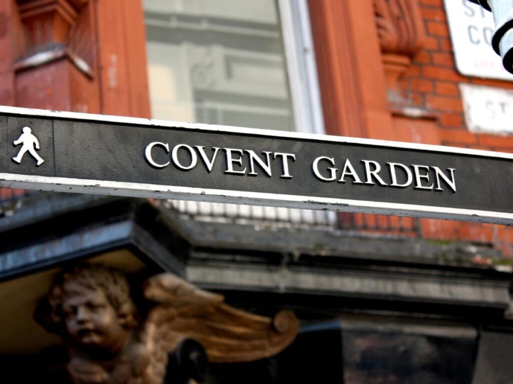 Boutique hotel entrance with flowers near Covent Garden, London.