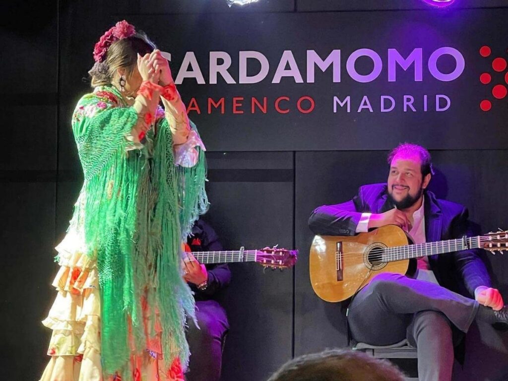 Flamenco dancer performing live at an intimate tablao in Madrid.