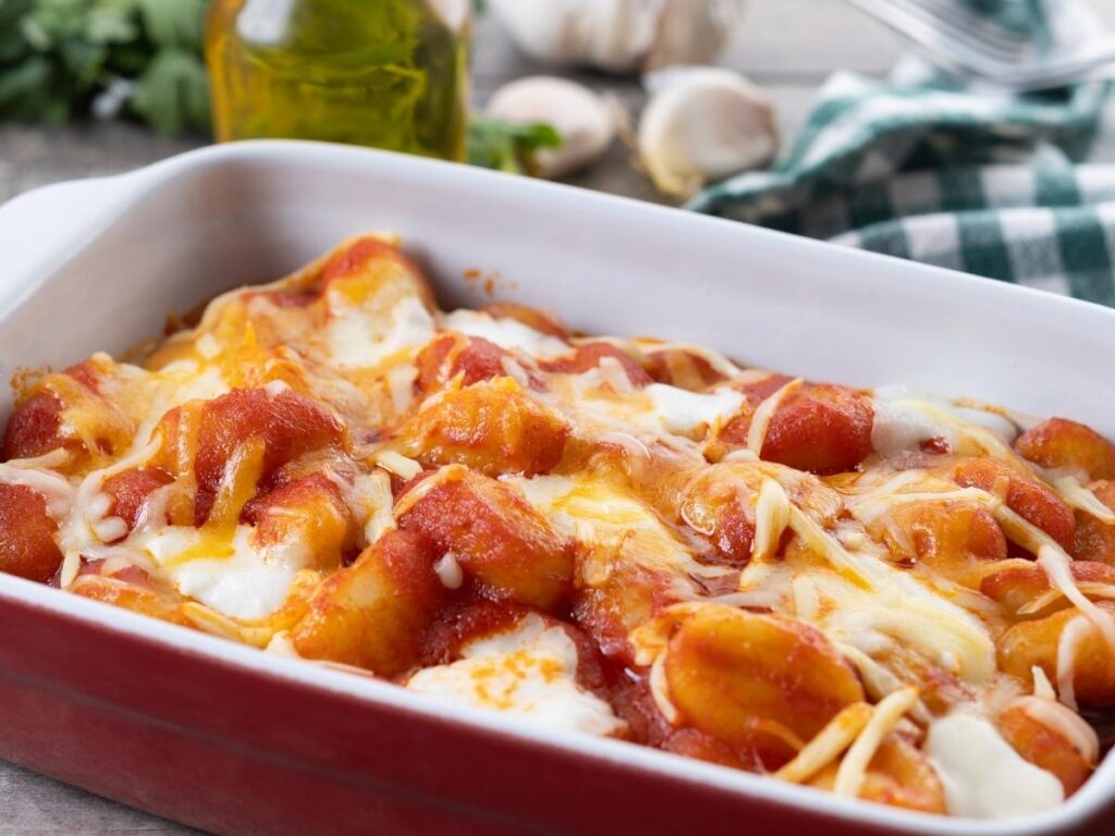 Bubbling gnocchi alla Sorrentina with melted mozzarella and basil.