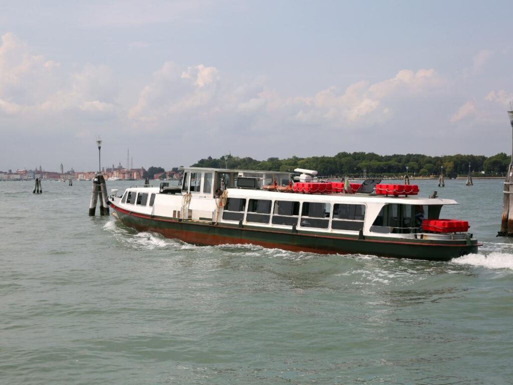 Ferry leaving Punta Sabbioni with Venice skyline on the horizon.
