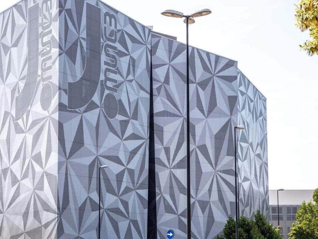 Exterior of Museo Storico Militare Vidotto with vintage military vehicles on display.