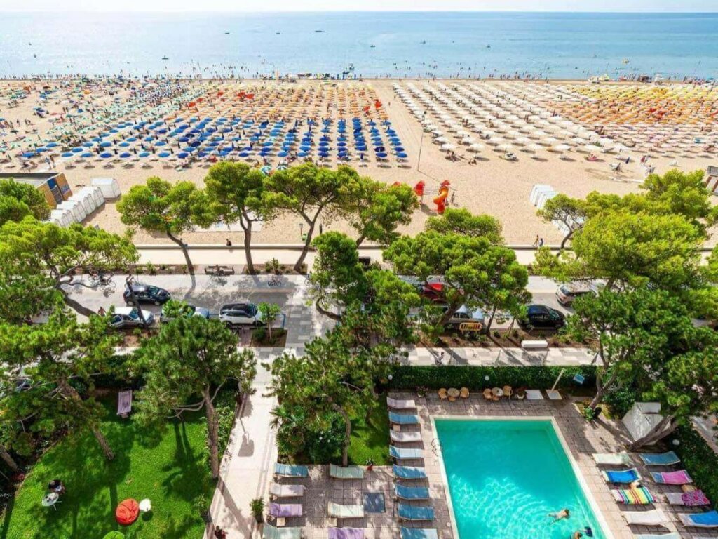 Rows of striped beach umbrellas on Sabbiadoro beach
