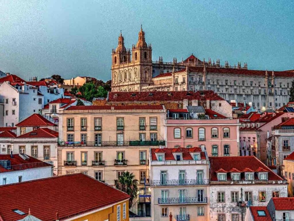 Portas do Sol viewpoint showing red-tiled rooftops and the Tagus River beyond
