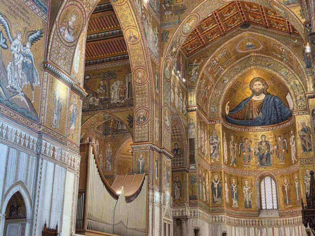Golden Byzantine mosaics covering the walls and apse of Monreale Cathedral near Palermo, Sicily

