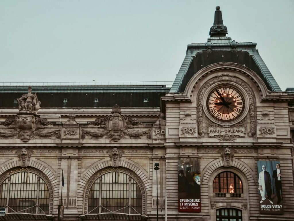 View of Paris through the large clock window inside Musée d’Orsay
