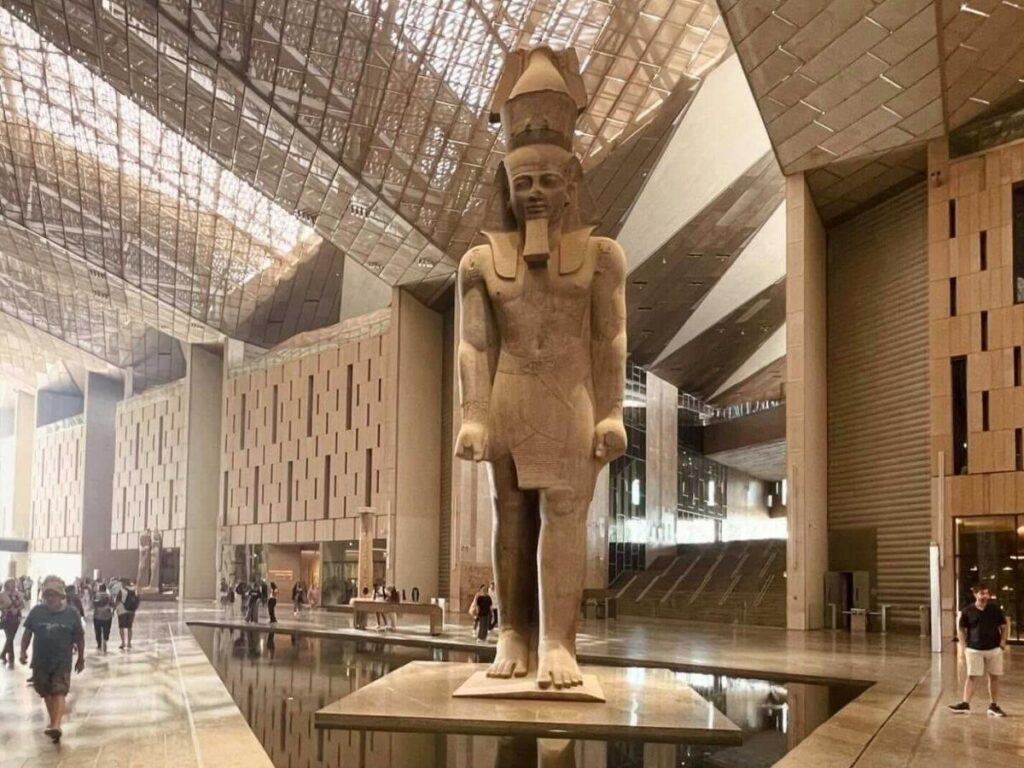 Visitors exploring ancient artifacts at Museo Egizio, Turin.