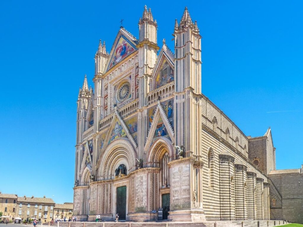 Colorful façade of Orvieto Cathedral with intricate mosaics